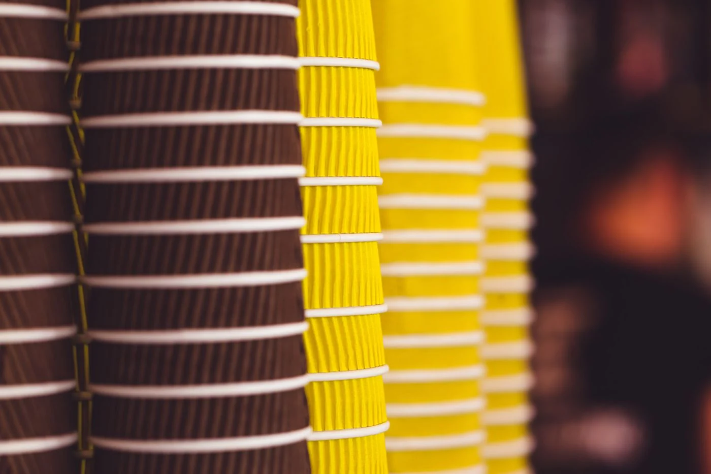 Stacks of corrugated disposable cups for pantry and hospitality use