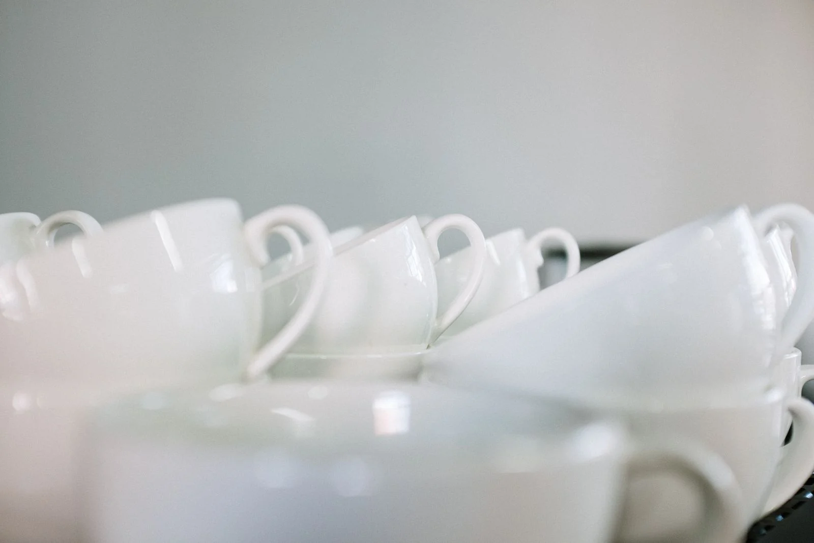 White cups arranged for workplace hospitality
