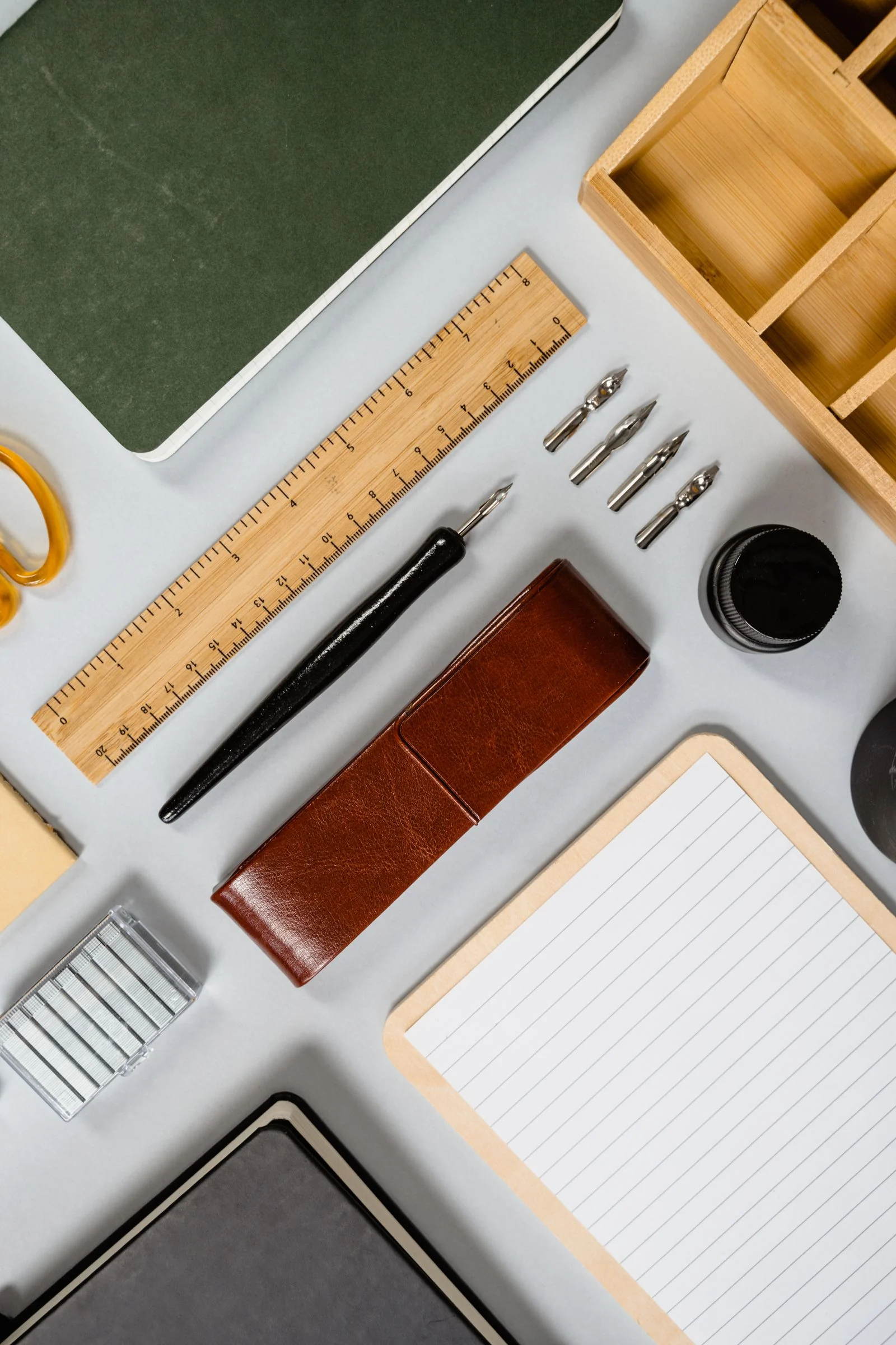 Notebooks, writing instruments, paper clips and office stationery