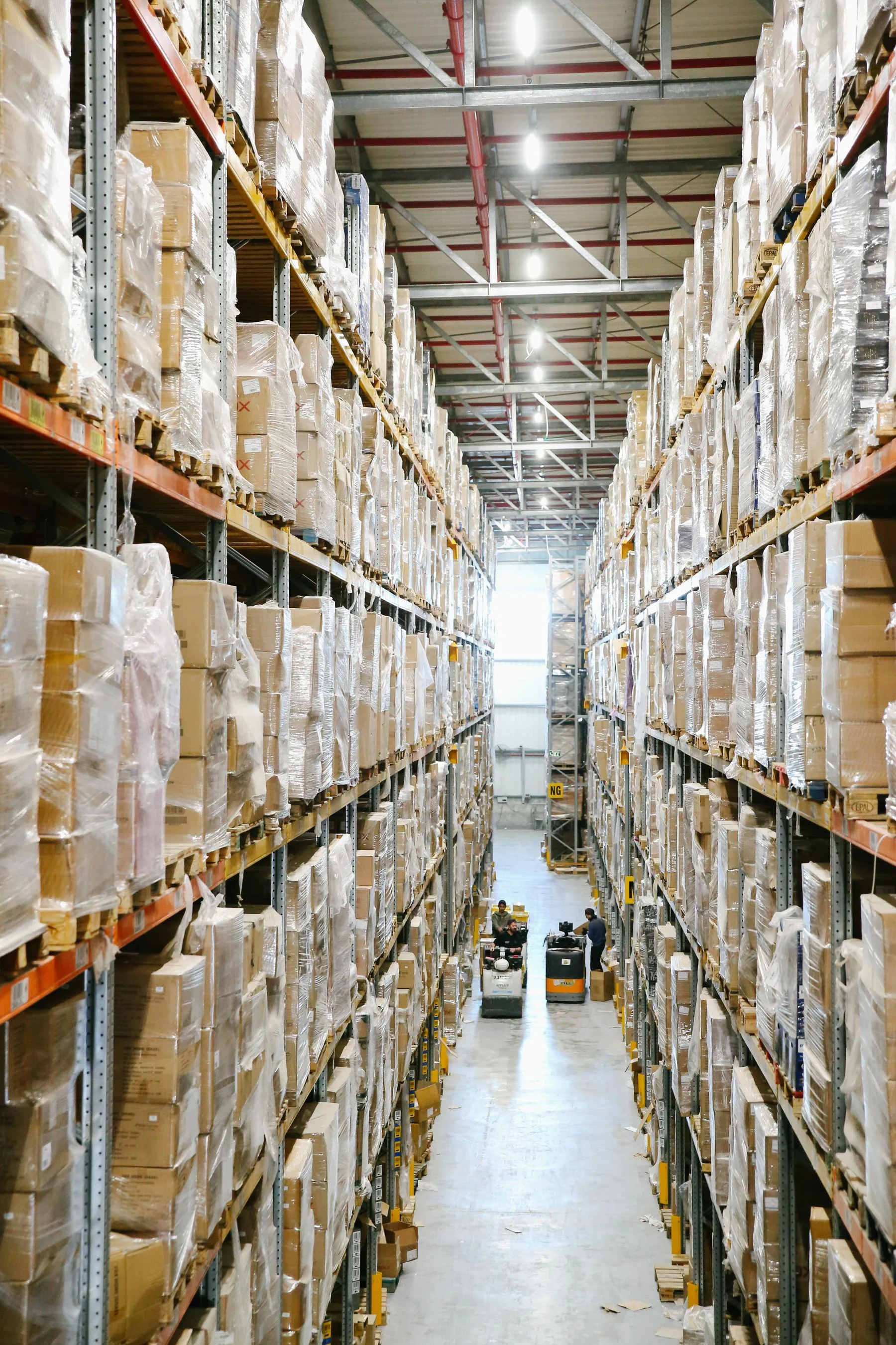 Organized warehouse shelving stocked with supplies